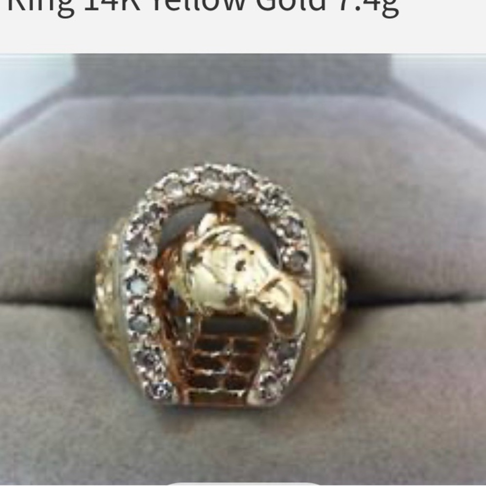 His & hers, horseshoe rings, both 14 karat gold.